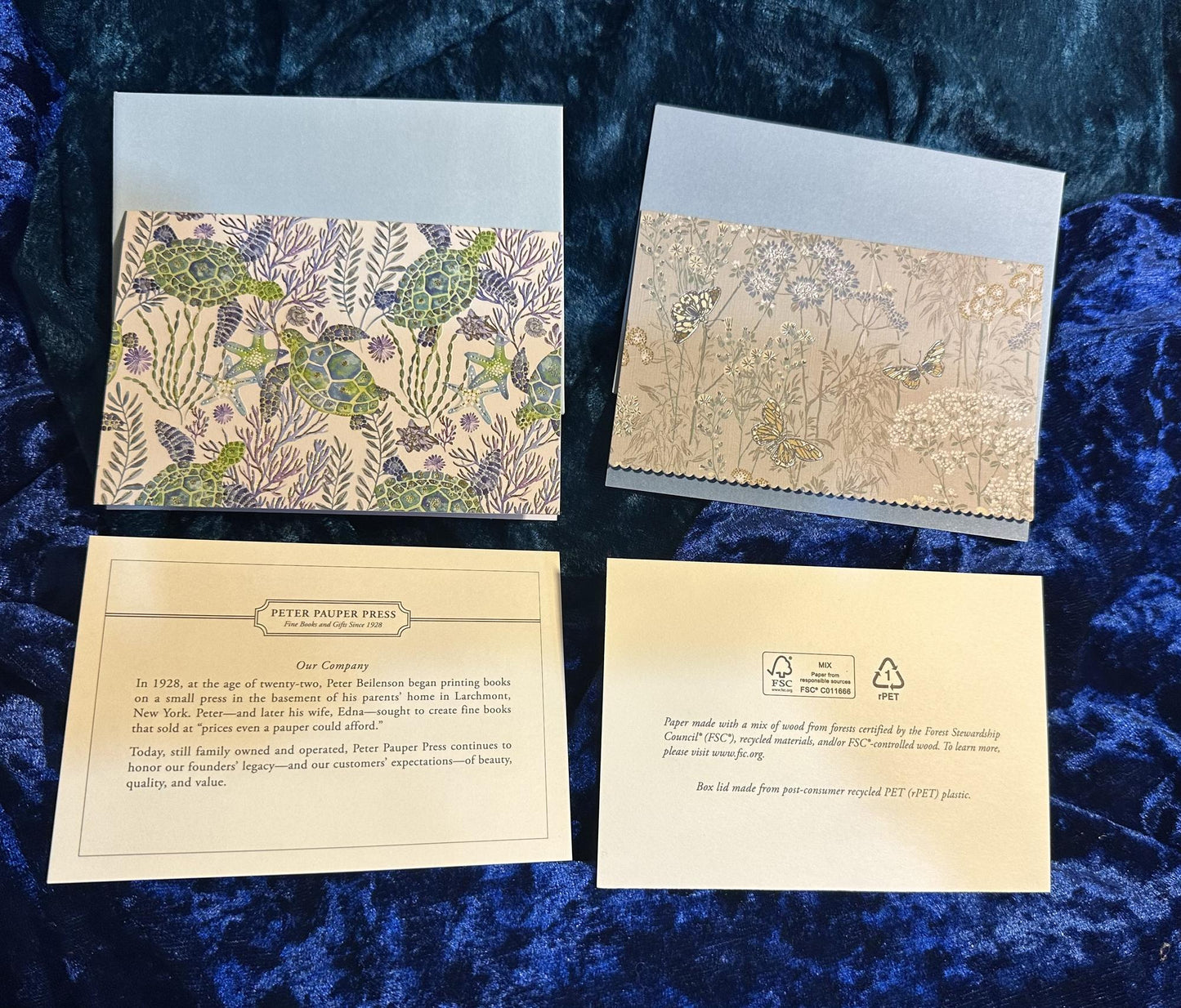 Two cards with different designs on a blue textured background