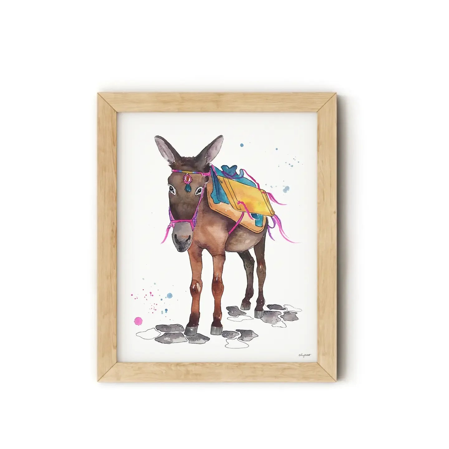 Framed illustration of a donkey with colorful saddle on a white background