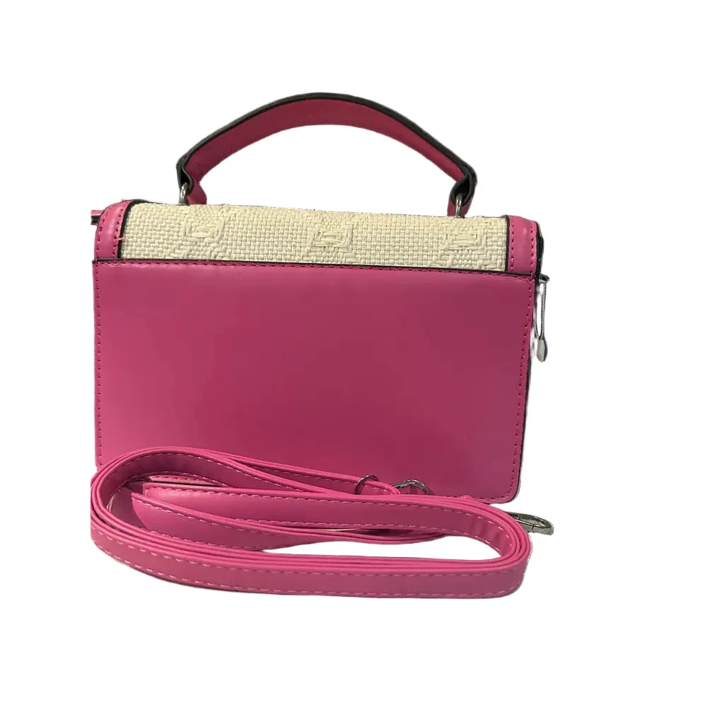 Pink handbag with beige top section on a white background
