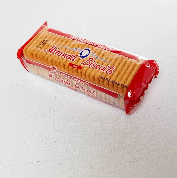 Packaged Miranda Biscuits with red and white packaging on a light gray background