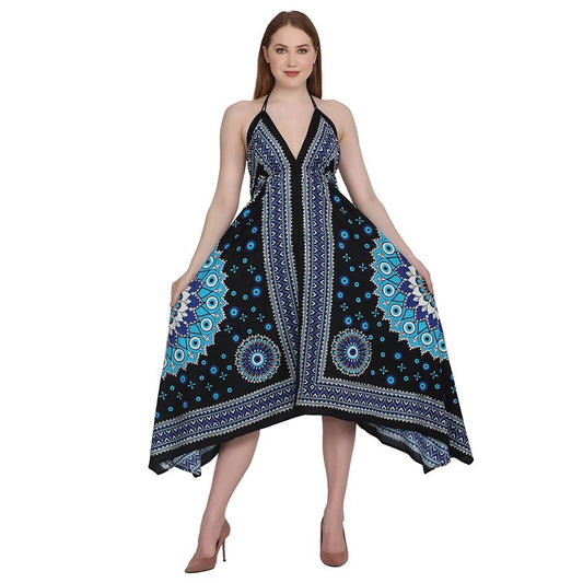 Woman wearing a black and blue patterned mati (evil eye) dress on a white background