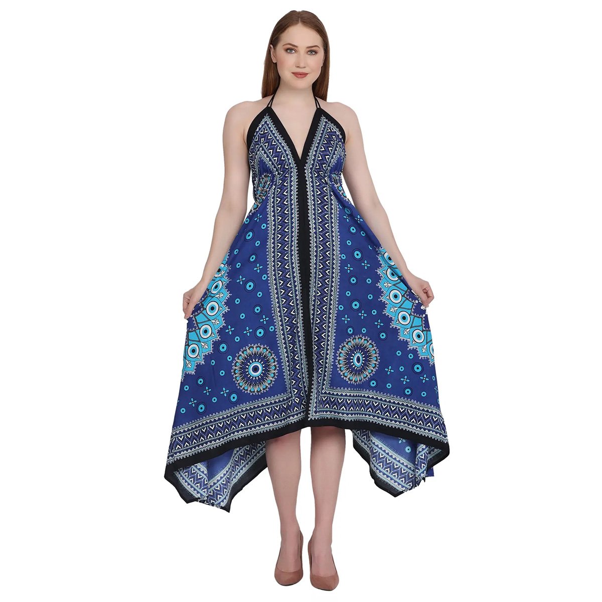 Woman wearing a blue patterned mati (evil eye) dress on a white background