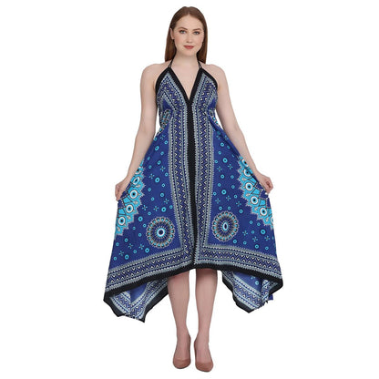 Woman wearing a blue patterned mati (evil eye) dress on a white background
