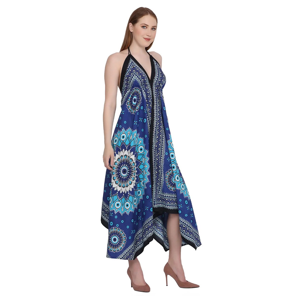 Woman wearing a blue patterned mati (evil eye) dress on a white background