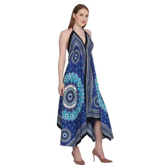 Woman wearing a blue patterned mati (evil eye) dress on a white background