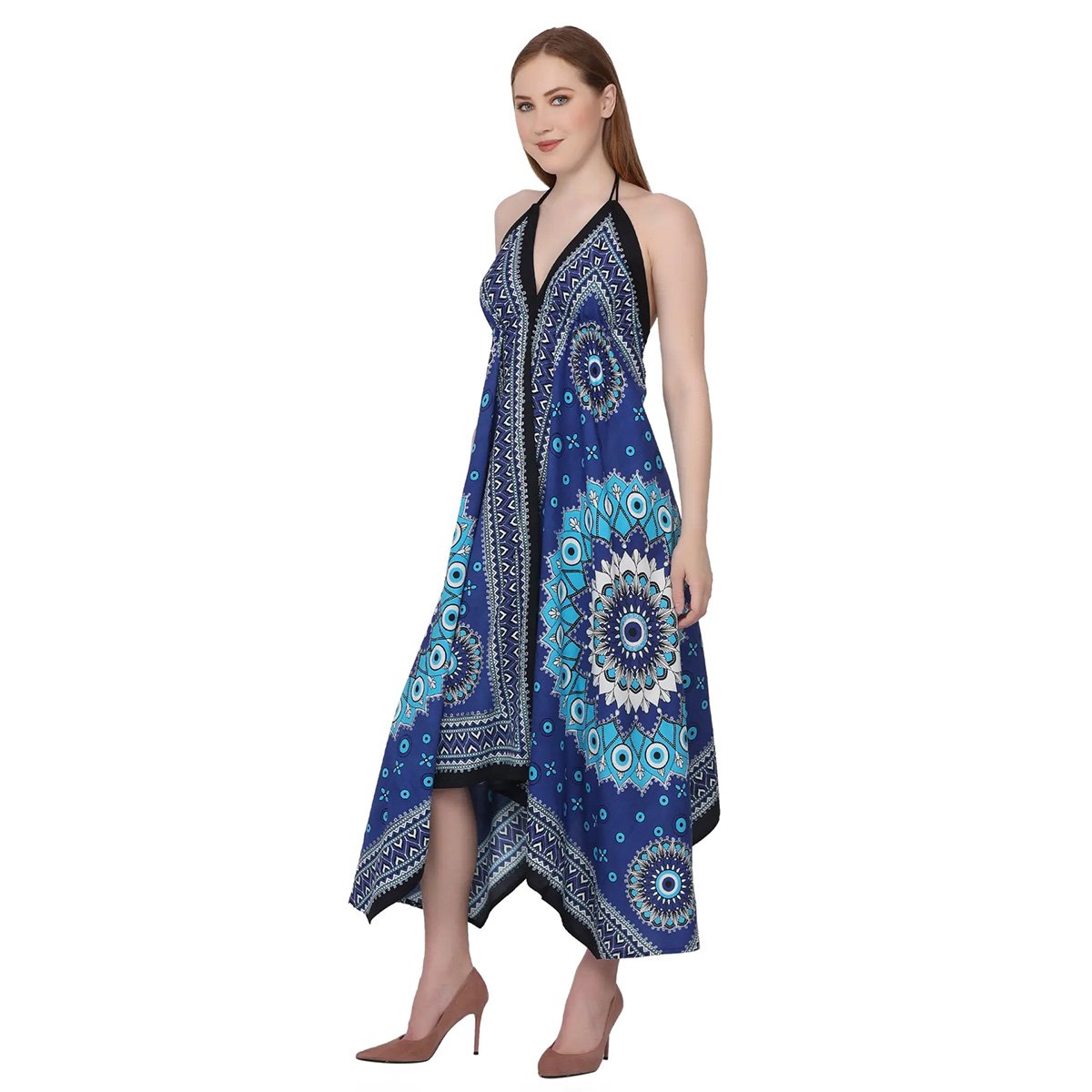 Woman wearing a blue patterned mati (evil eye) dress on a white background