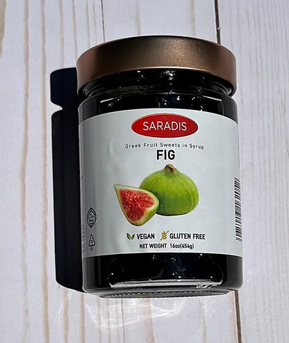 Jar of Saradis Fig Spread on a wooden surface