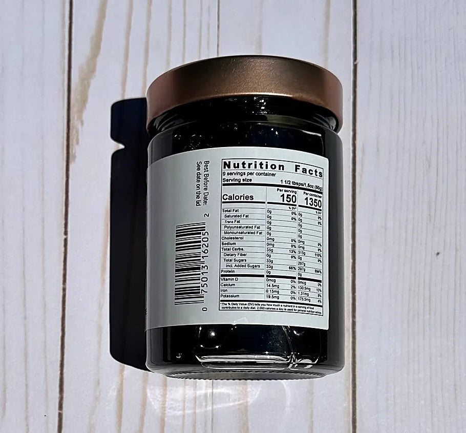 Jar with a nutrition facts label on a wooden surface