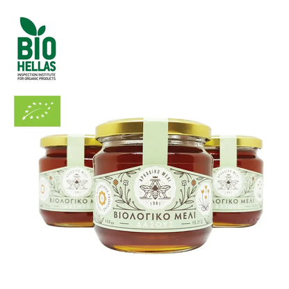 Jars of honey with 'BIO HELLAS' certification on a white background