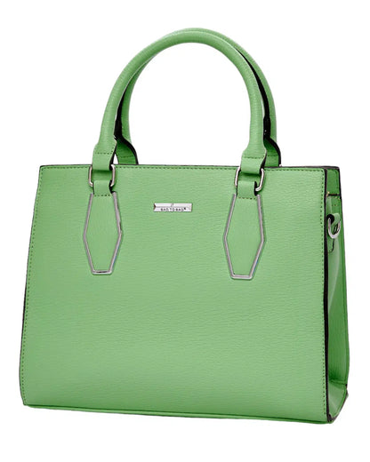 Green handbag with a visible brand logo on a white background