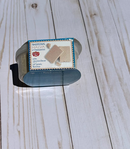 Box of halva on a wooden surface