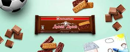 Papadopoulos Chocolate Covered Miranda Biscuits package with scattered pieces on a light green background