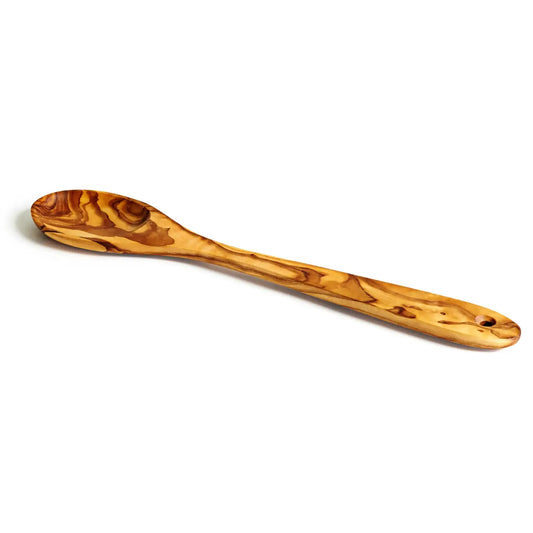 Wooden spoon on a white background