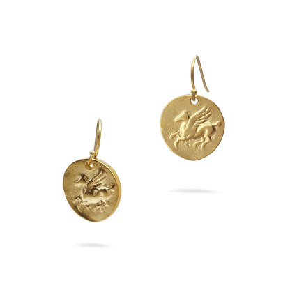 Gold Pegasus earrings with engraved designs on a white background