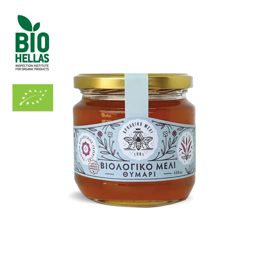 Jar of honey with a label and Bio Hellas logo on a white background