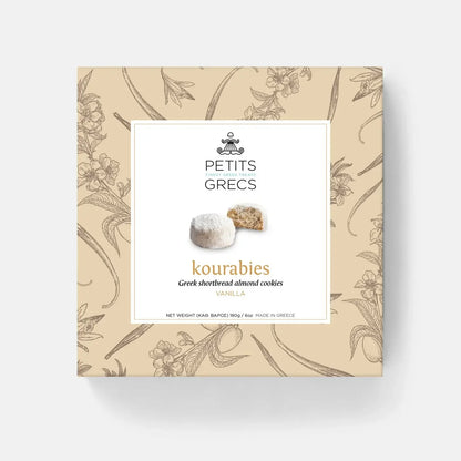 Box of Petits Grecs kourabies cookies with decorative design on a white background