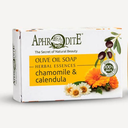 Aphrodite olive oil soap packaging with herbs and flowers on a white background