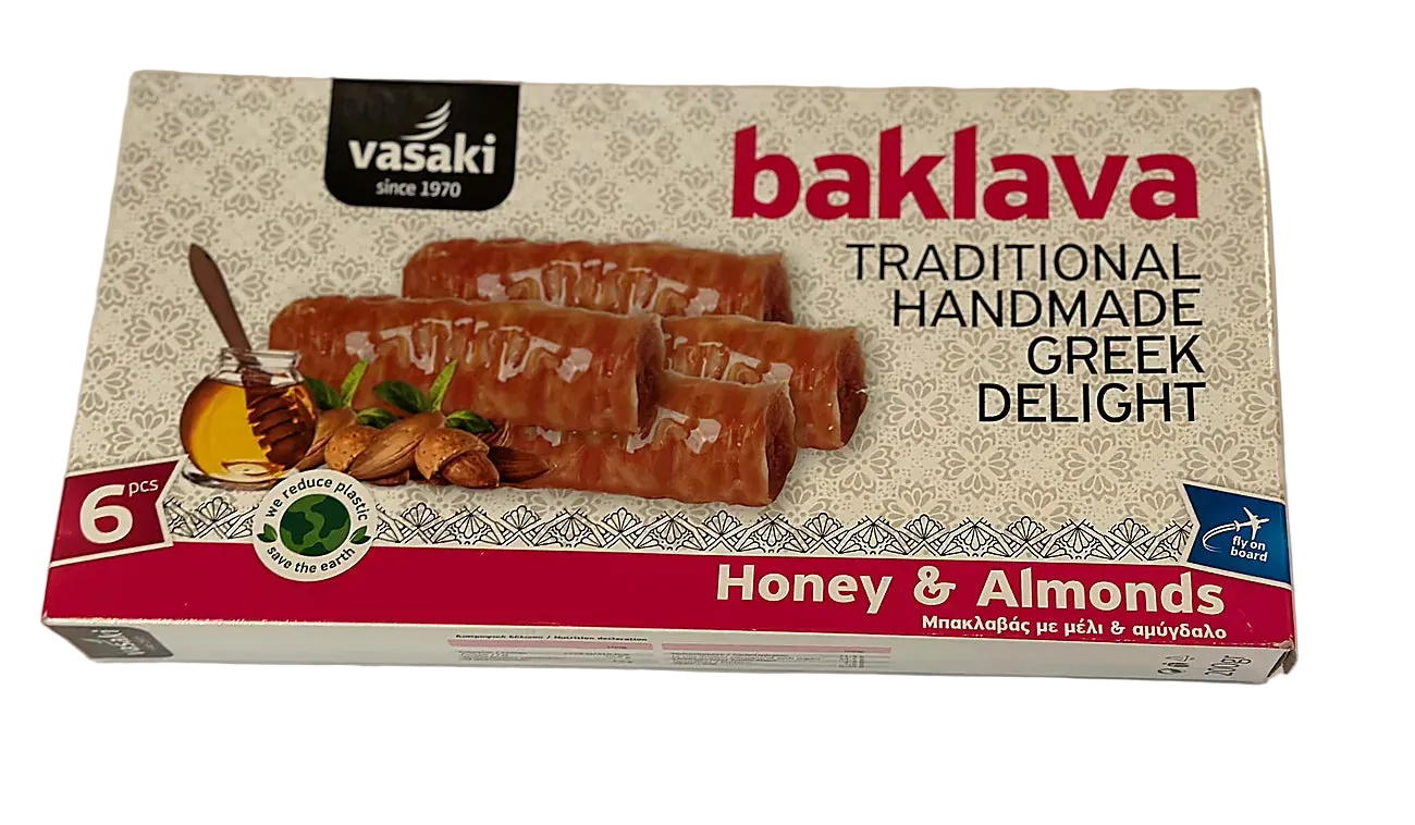 Box of Vasaki baklava with honey and almonds on a white background