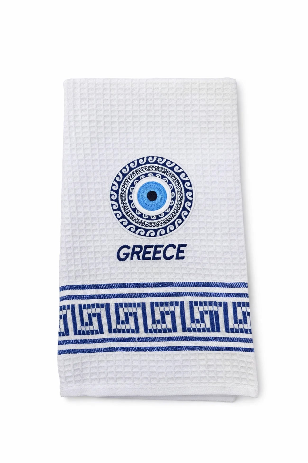 White towel with blue decorative elements, including a 'Mati' evil eye and 'Greece' text on a white background