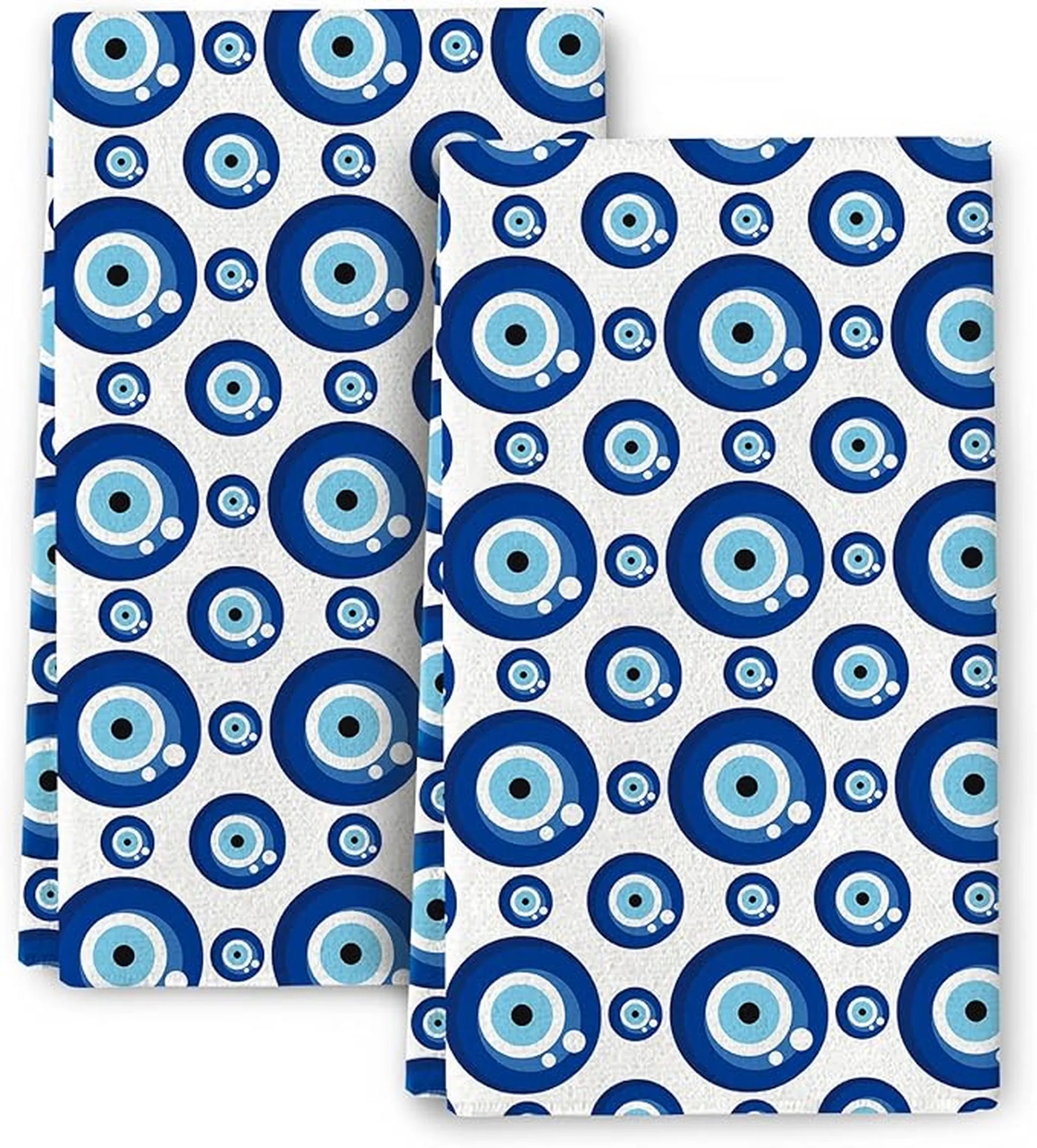 Two folded towels with blue and white evil eye circular pattern on a white background