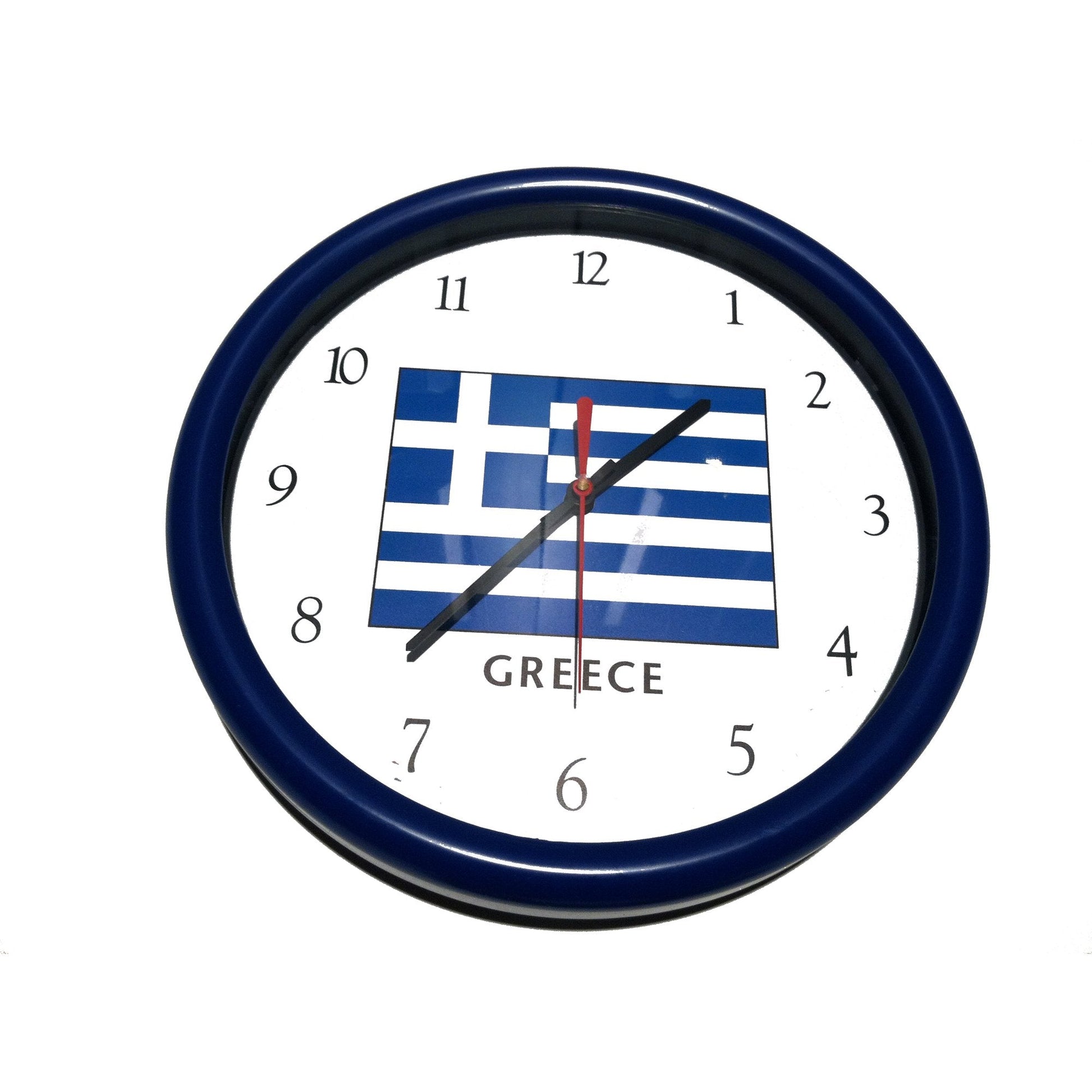 Wall clock with Greek flag design on a white wall background