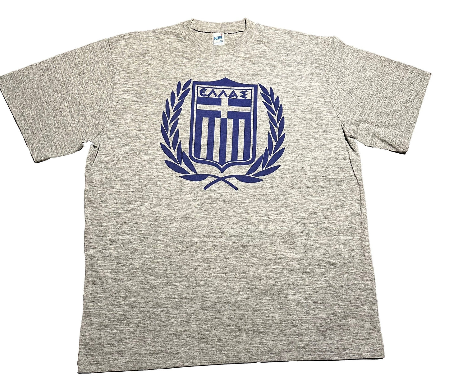Gray t-shirt with a blue emblem on a white background