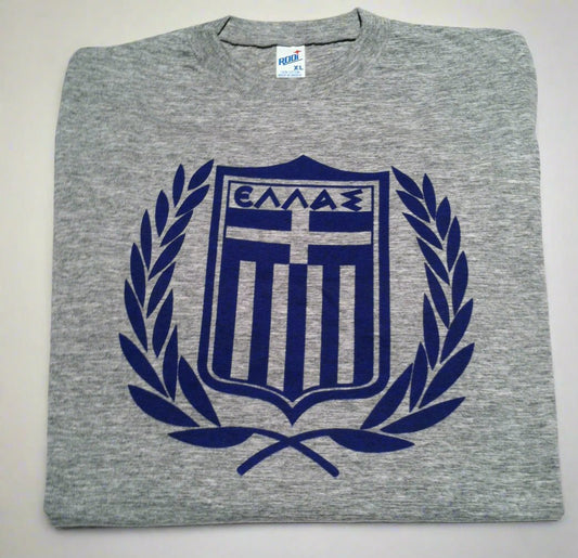 Gray sweatshirt with blue emblem featuring Greek letters that read Hellas on a white background