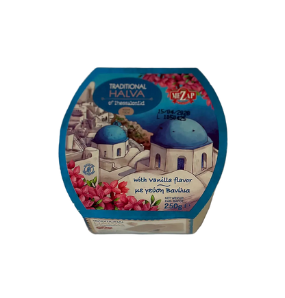 Packaged halva with a colorful label featuring architectural elements and flowers on a white background.