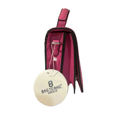 Pink bag with a 'Bag to Bag Greece' tag on a white background