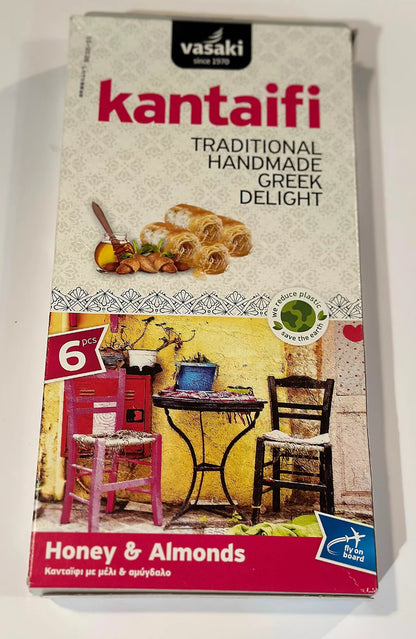 Box of Vasaki kantaifi with honey and almonds flavor on a white background