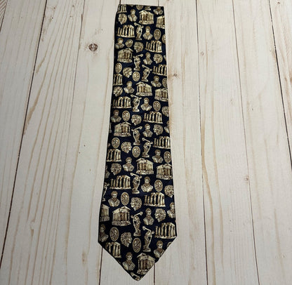 Navy tie with classical Greek architecture design on a wooden surface