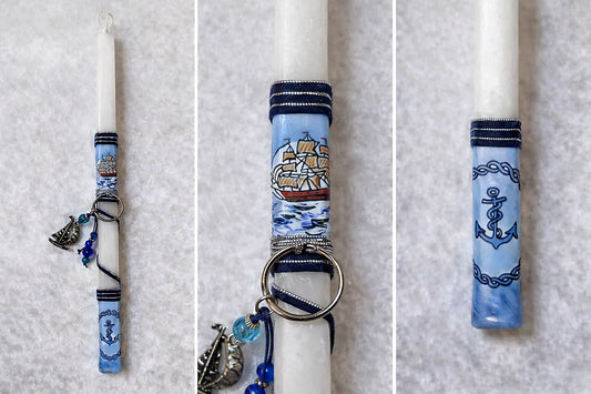 Decorative candle wraps with nautical designs on a white background