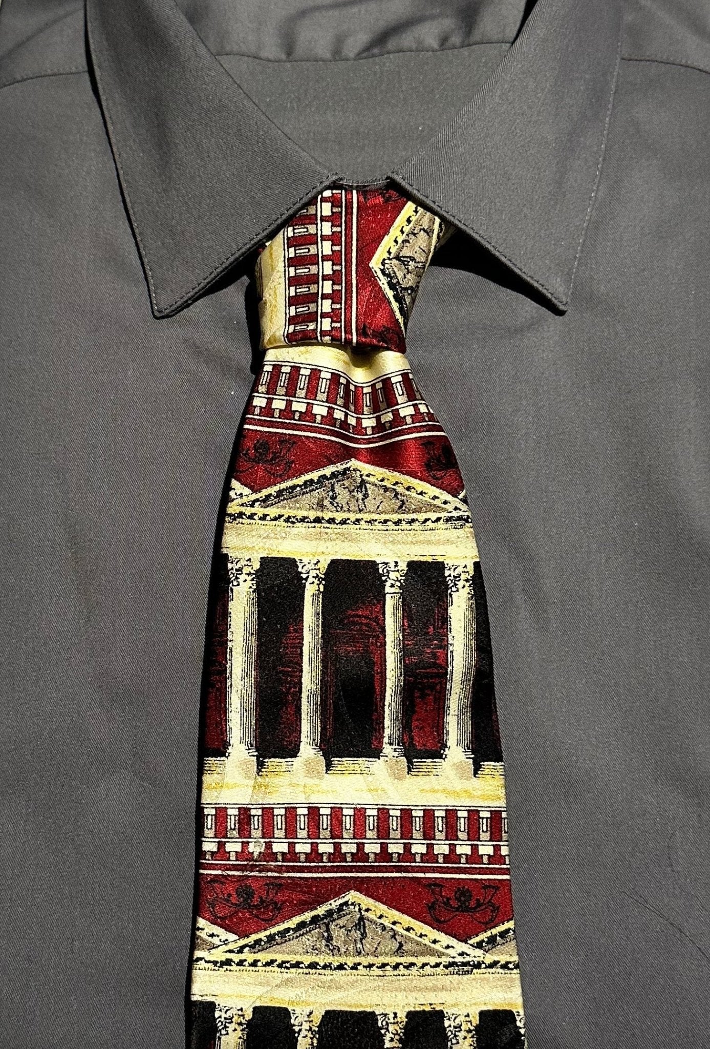 Tie with Greek column architectural design on a gray shirt