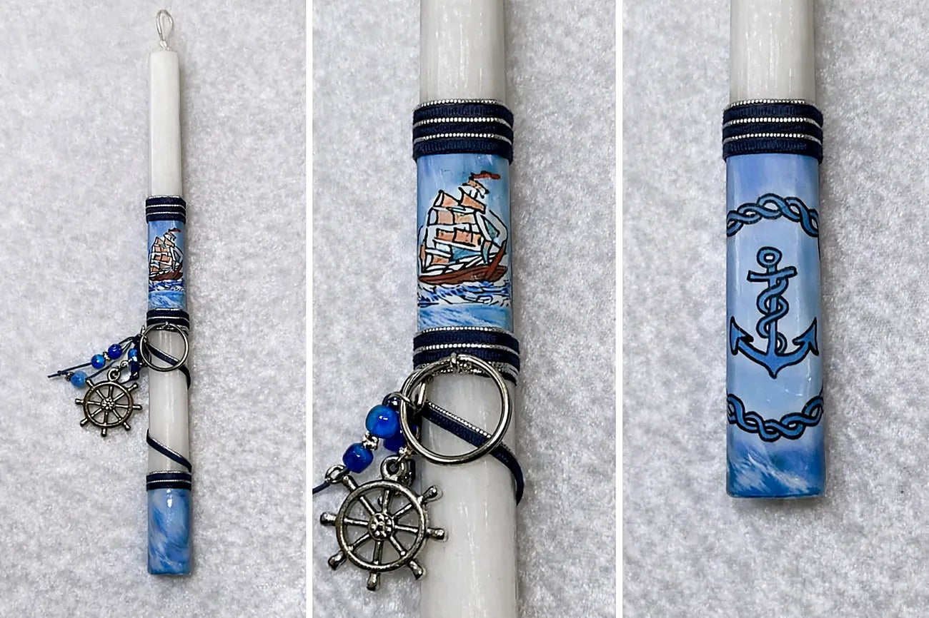 Decorative candles with nautical-themed ribbons and charms on a gray background