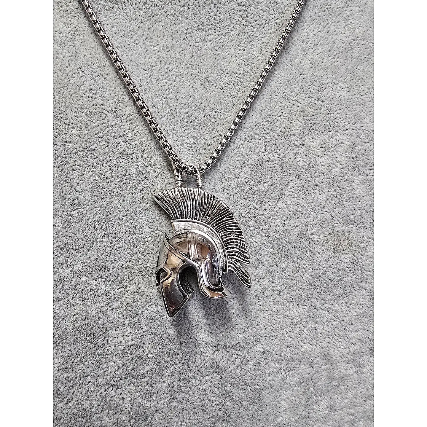 Spartan Helmet pendant—back detail showing sculpted crest and polished stainless finish